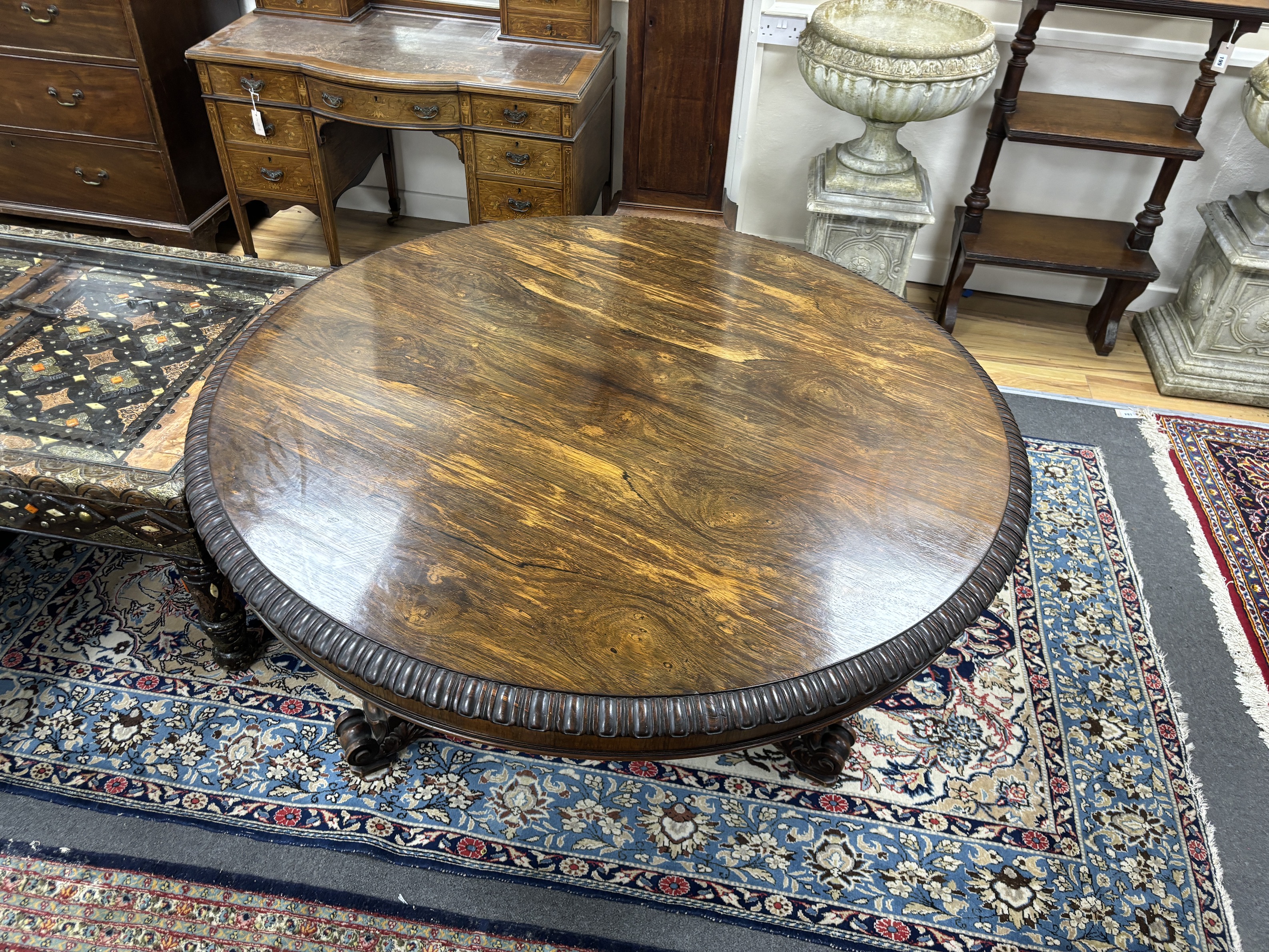 A William IV circular rosewood centre table, the tilt top with lappet carved edge on single - Image 5 of 5