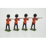 Thirty-five early twentieth century Britains lead infantry soldiers; twenty Grenadier guards in