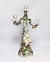 A 19th century Sitzendorf floral encrusted four light figural candelabra, 50cm