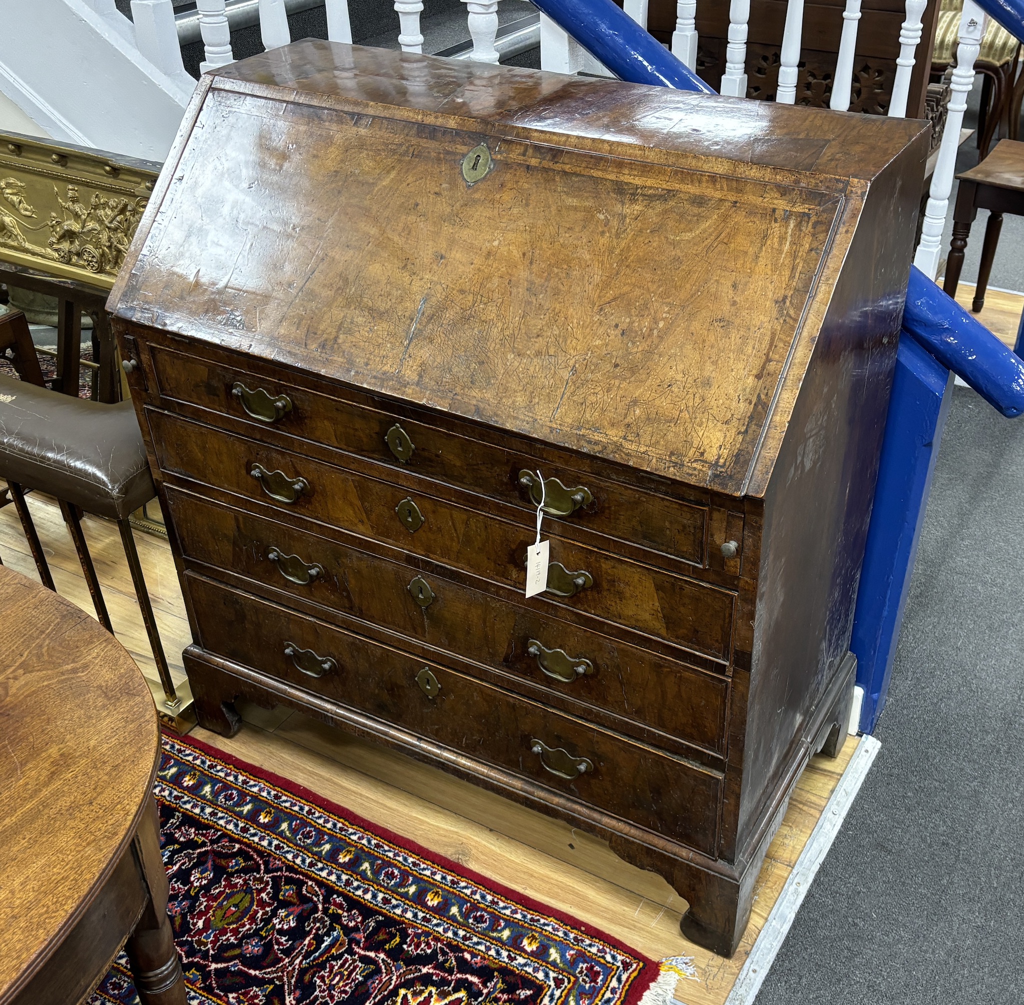 An 18th century walnut bureau, width 97cm, depth 50cm, height 104cm