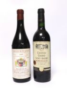 A bottle of Chateau Grand Saint-André Bordeaux 2004 and a bottle of Monprivato Barolo Mascarello