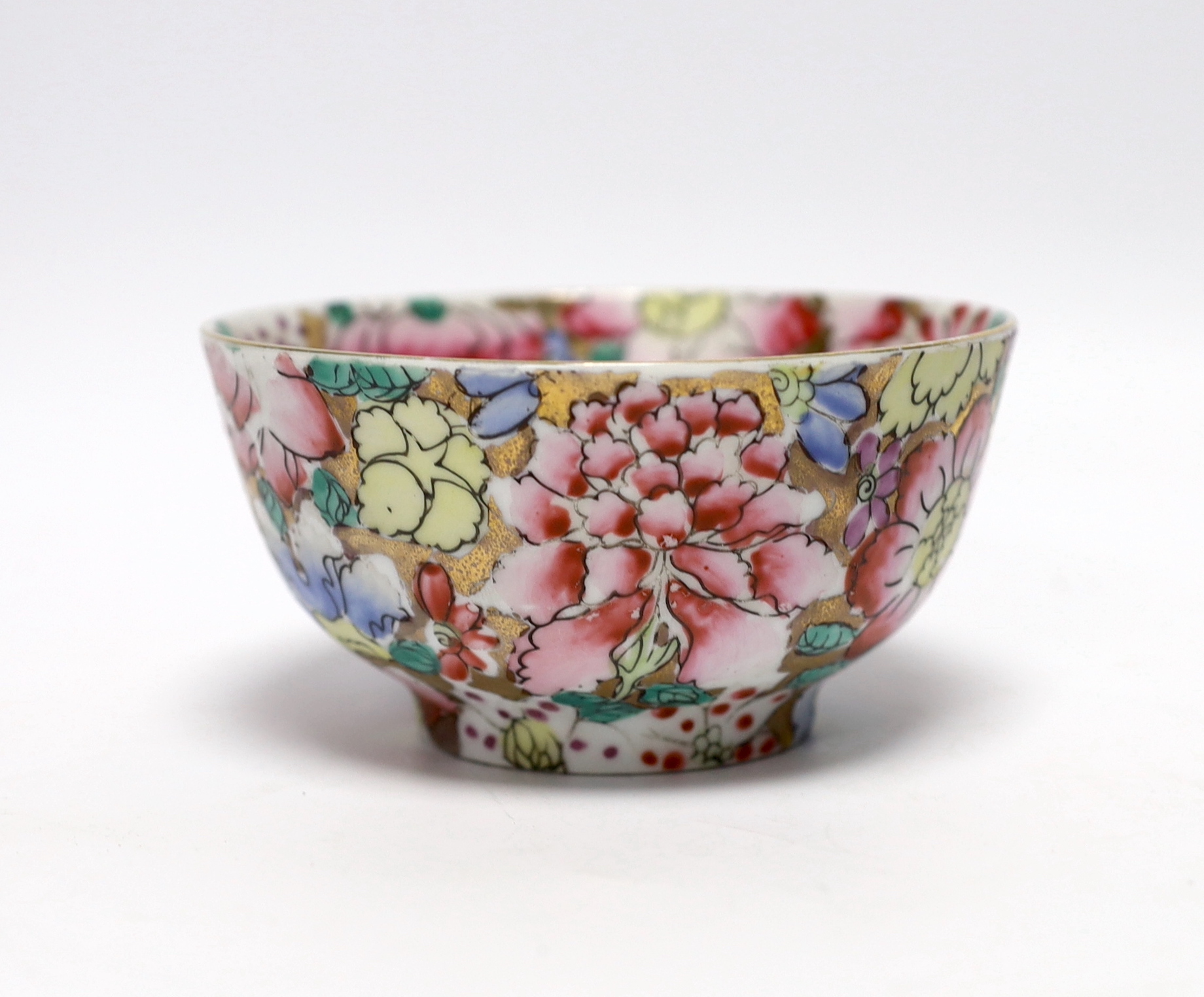 A small circular Chinese porcelain bowl having polychrome 'millefiore' and gilt decoration, diameter