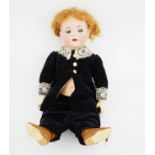 A K&R Kammer & Reinhart /S & H bisque 121 head doll on toddler body, with vintage shoes and socks,