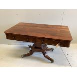 A Regency rectangular rosewood centre / library table, fitted two frieze drawers and two dummy