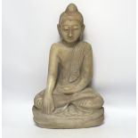 A Burmese carved alabaster model of a seated buddha, 46cm