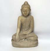 A Burmese carved alabaster model of a seated buddha, 46cm