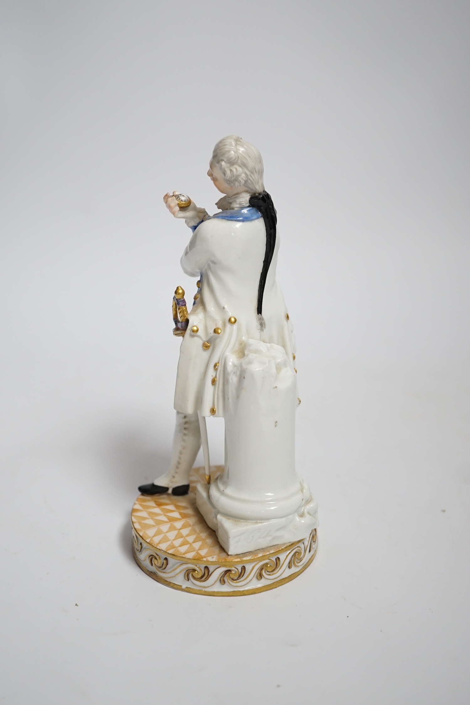 A Meissen style porcelain figure of a soldier in dress uniform with sword and holding aloft a pocket - Image 2 of 4