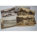 A collection of vintage topographical postcards including some local views