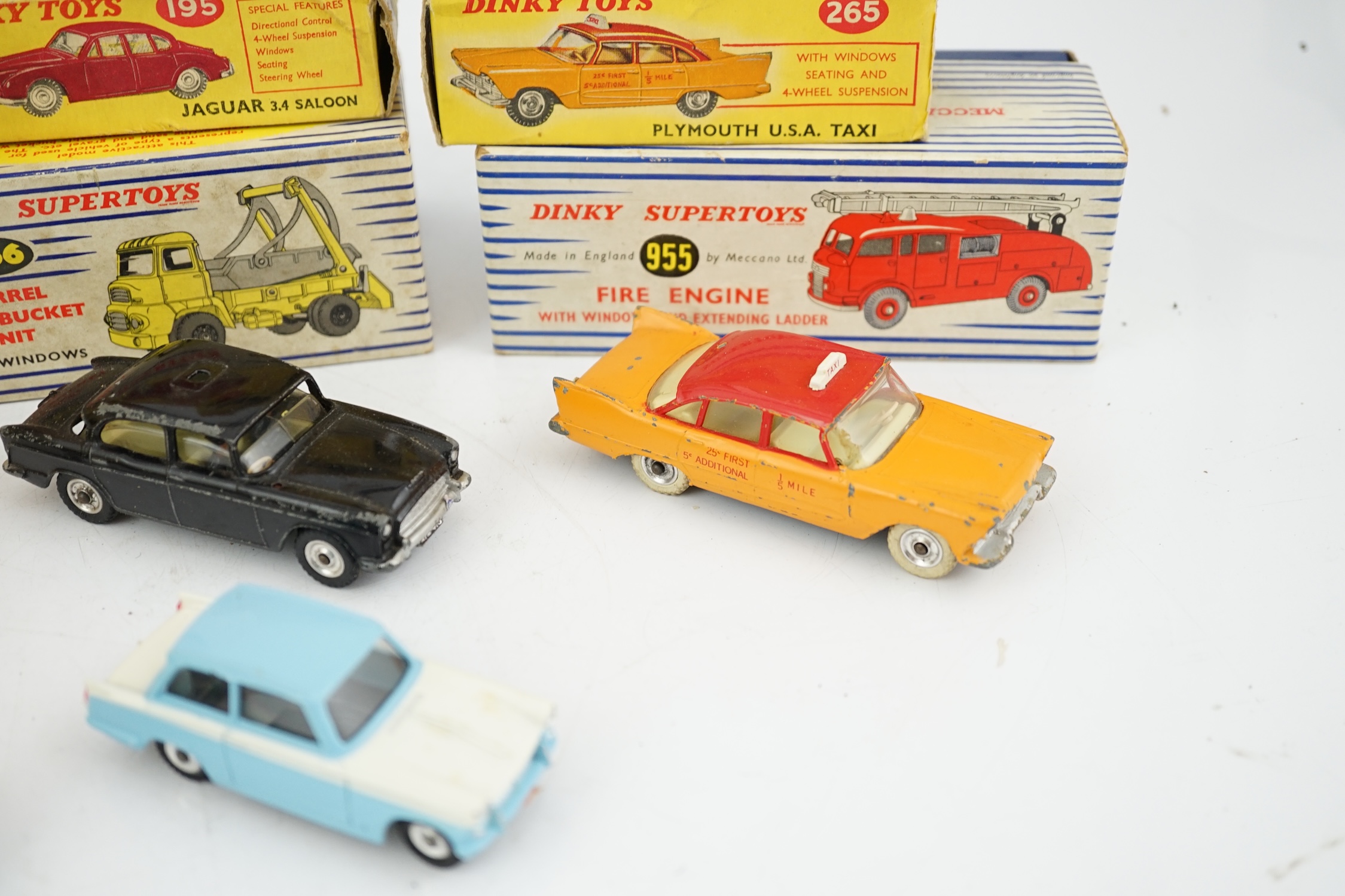 Eleven boxed Dinky Toys; a Triumph Herald (189), a Plymouth U.S.A. Taxi (265), a Chevrolet ‘El - Image 6 of 8