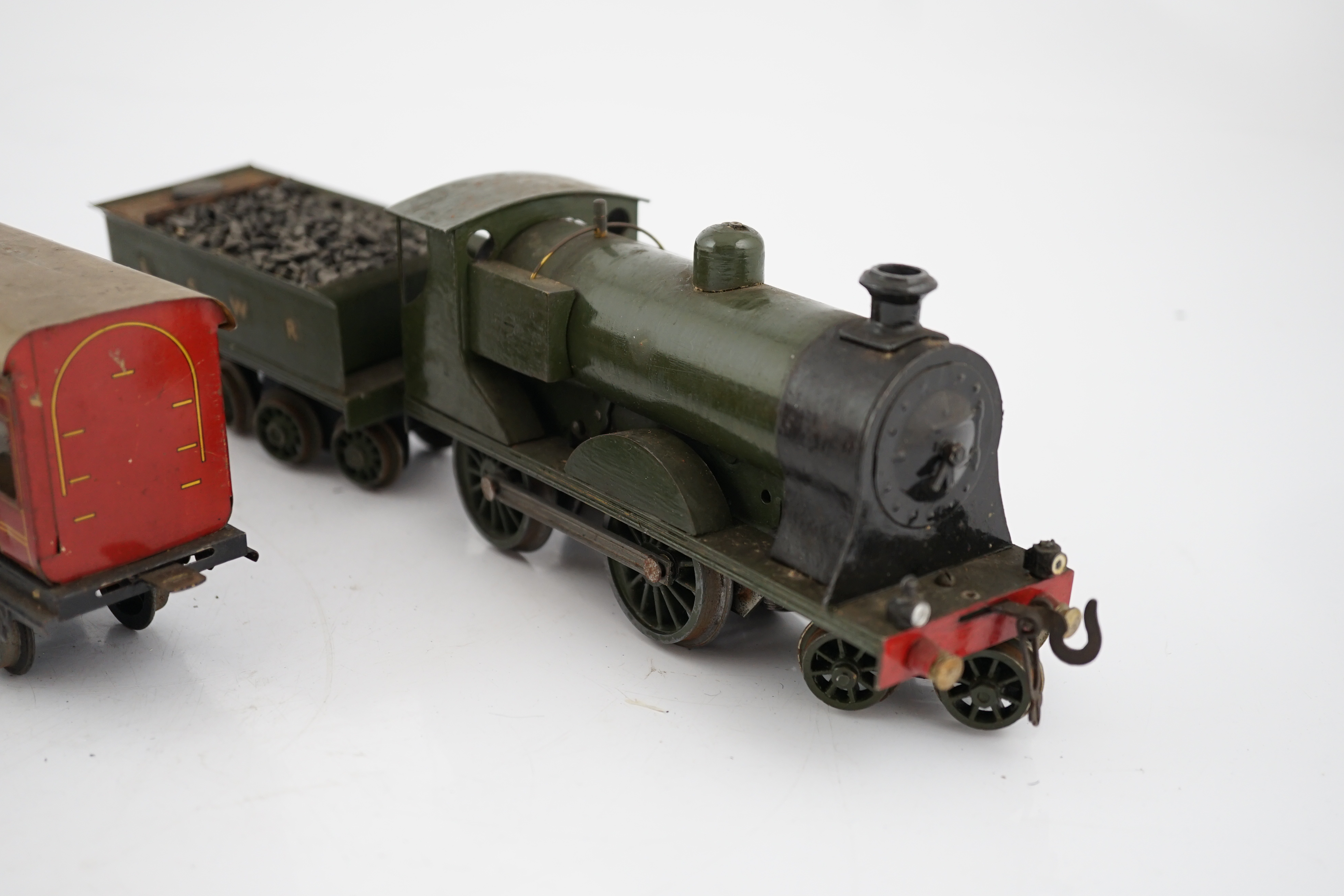 Ten 0 gauge tinplate railway items, most adapted from other parts and models, including three - Image 5 of 12