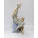 A Lladro figure group of a clown and ballerina, 42cm