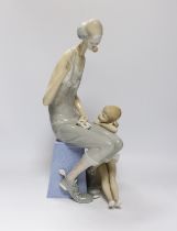 A Lladro figure group of a clown and ballerina, 42cm