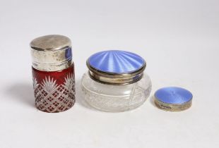 A silver and enamel compact, a silver and enamel mounted glass jar and an Edwardian silver mounted