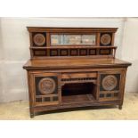 A late Victorian Aesthetic movement oak and parcel ebonised mirror back sideboard, width 183cm,