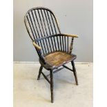 A 19th century elm and beech Windsor comb back armchair, width 58cm, depth 36cm, height 100cm