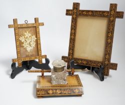 A Tunbridge ware inkstand with cut glass bottle and pen, together with two frames, largest 22.5cm