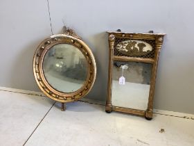 A Regency giltwood pier mirror, inset verre eglomise panel depicting 'Harvest', height 58cm together