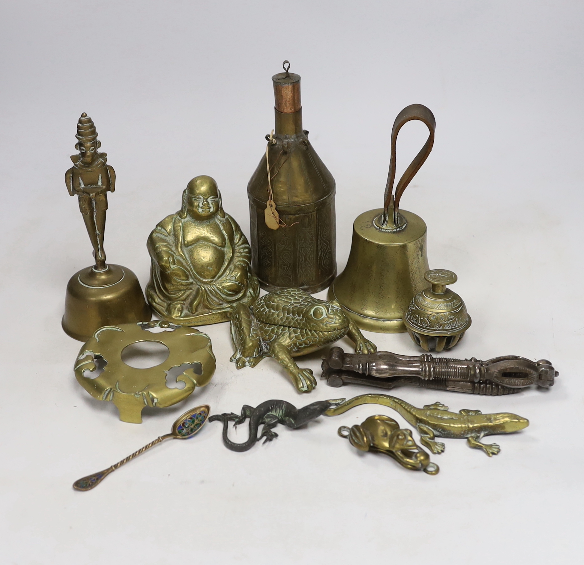 Sundry metalware including hinged brass frog with compartment, nutcrackers, a seated Buddha and a