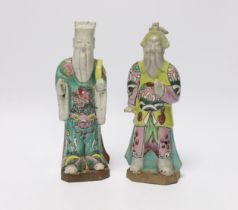 Two late 18th century Chinese enamelled porcelain figures of immortals, 19cm high