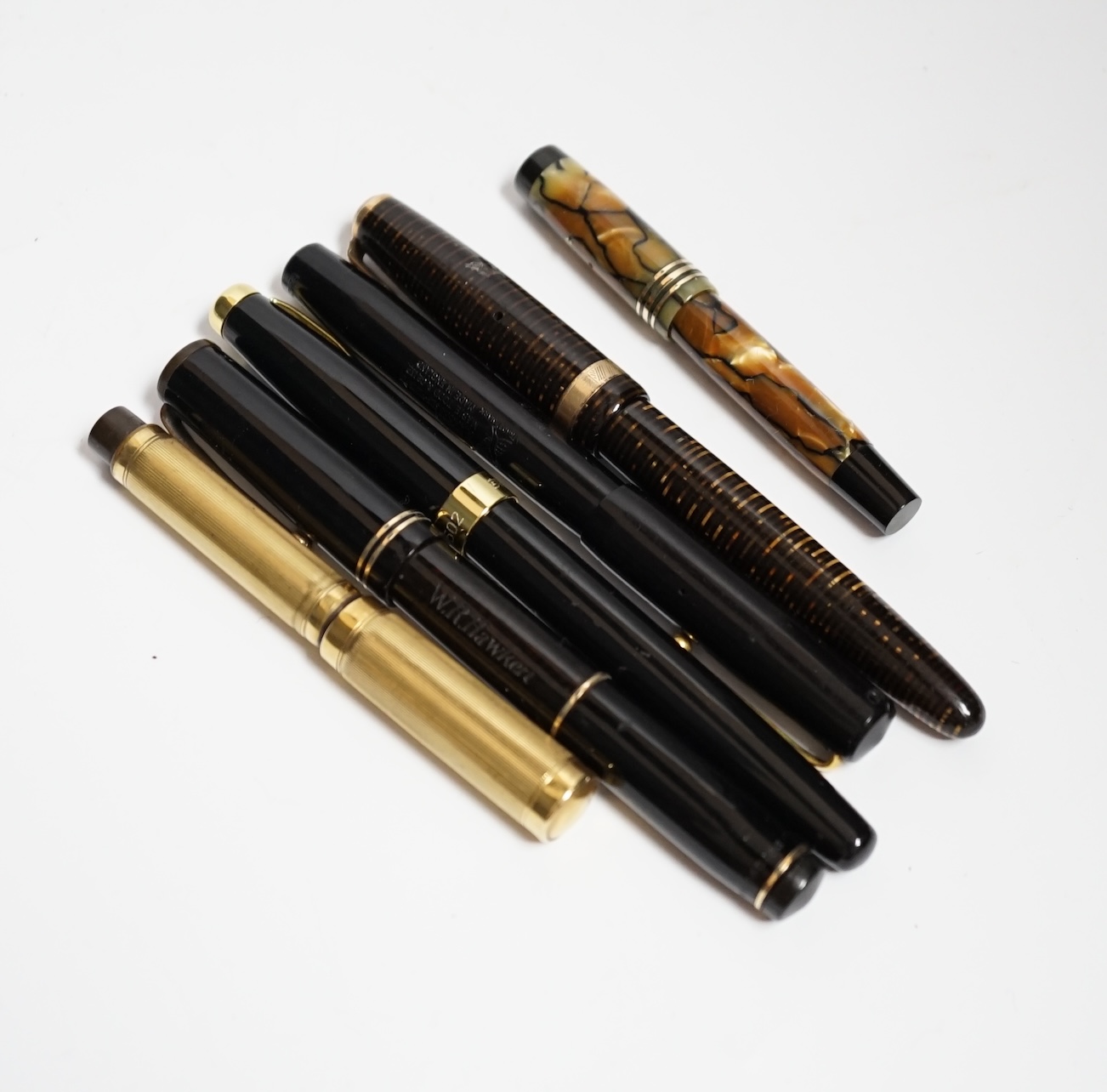 Six fountain pens including Parker and Swan, some with 14k nibs