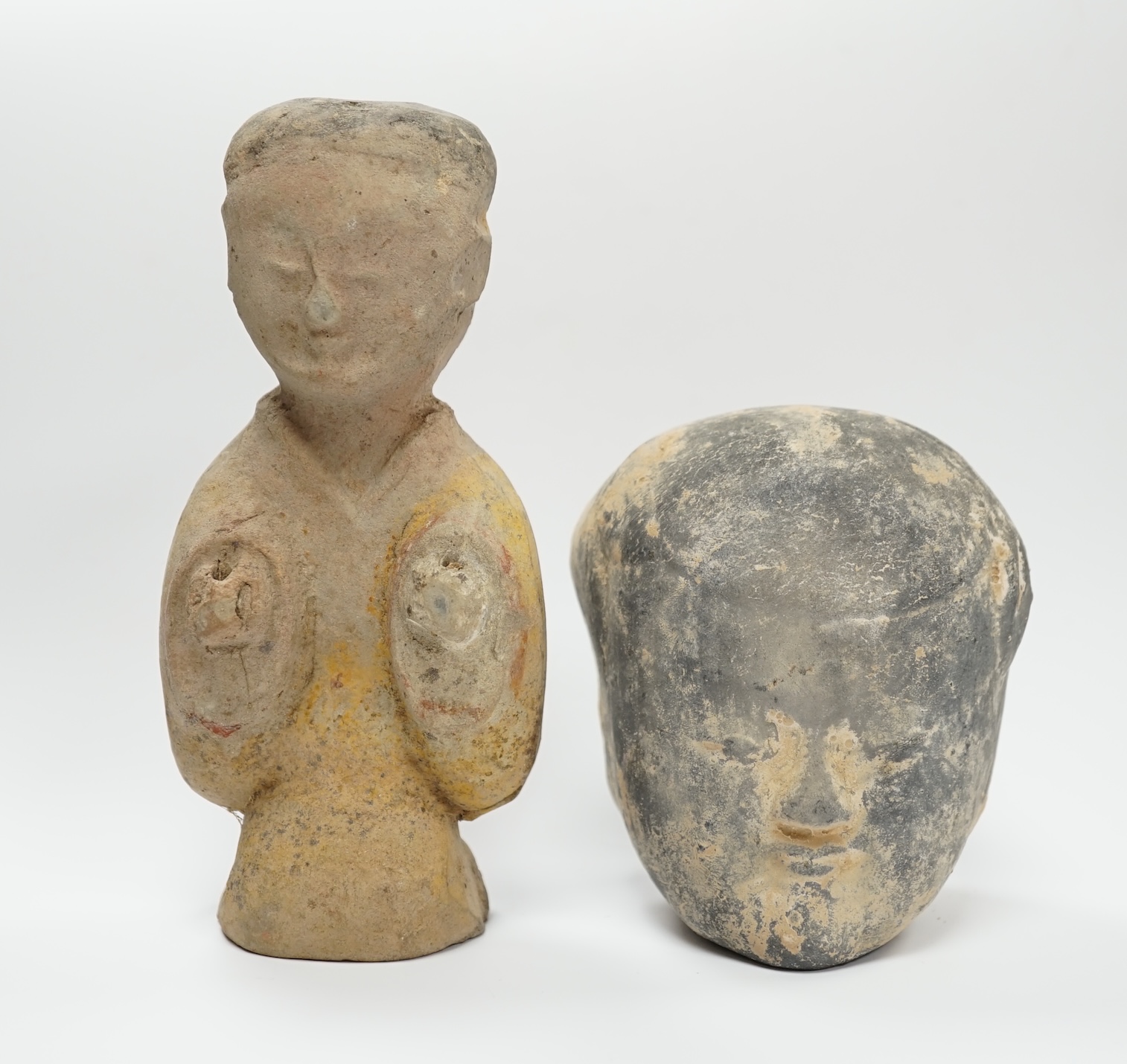 A Chinese grey pottery head and a bust, Han dynasty, tallest 17cm