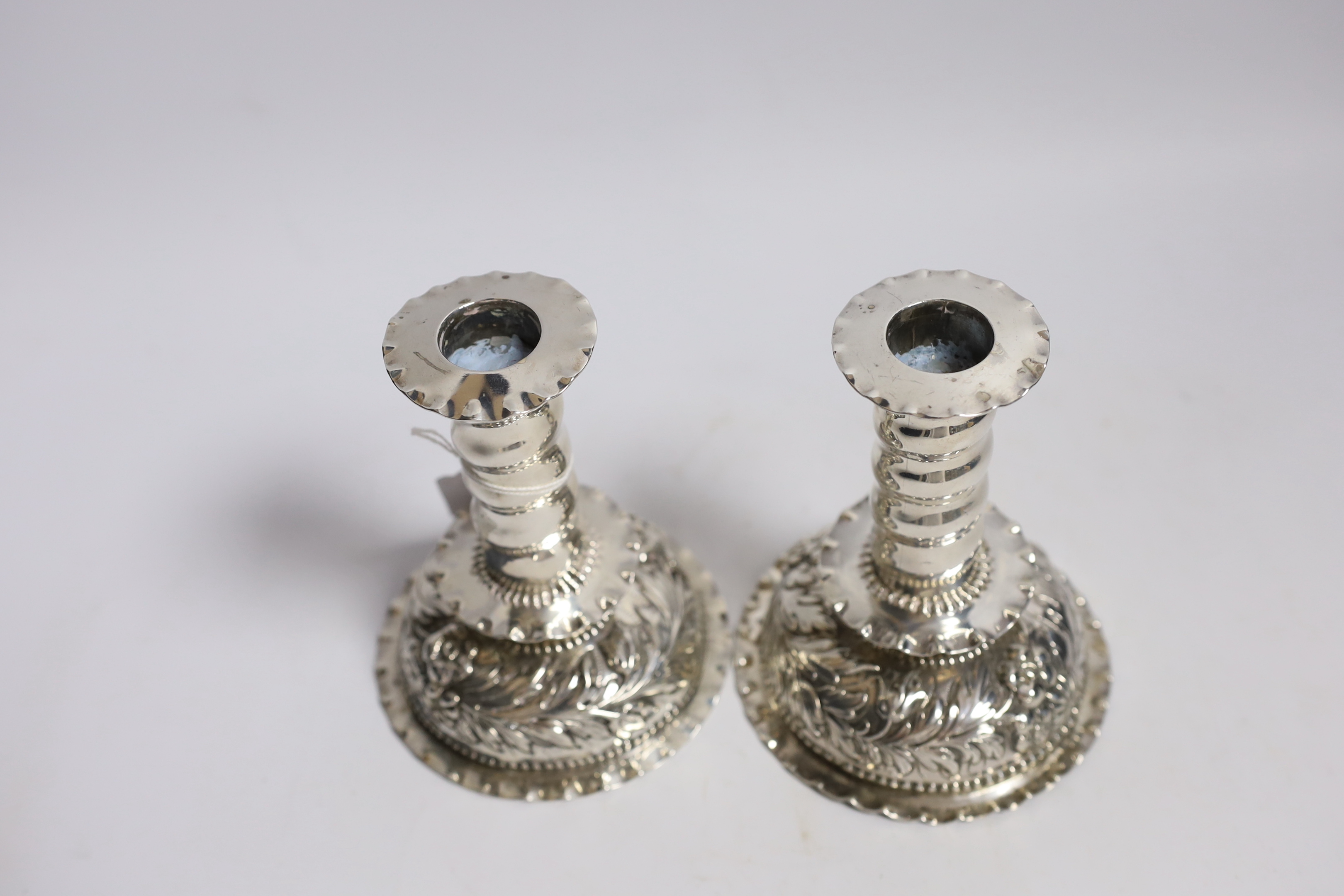A matched pair of Carolean style silver dwarf candlesticks, London, 1880 & 1885, makers mark on - Image 3 of 4