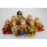 A set of Merrythought Snow White and the Seven Dwarves, Snow White with Merrythought label to the