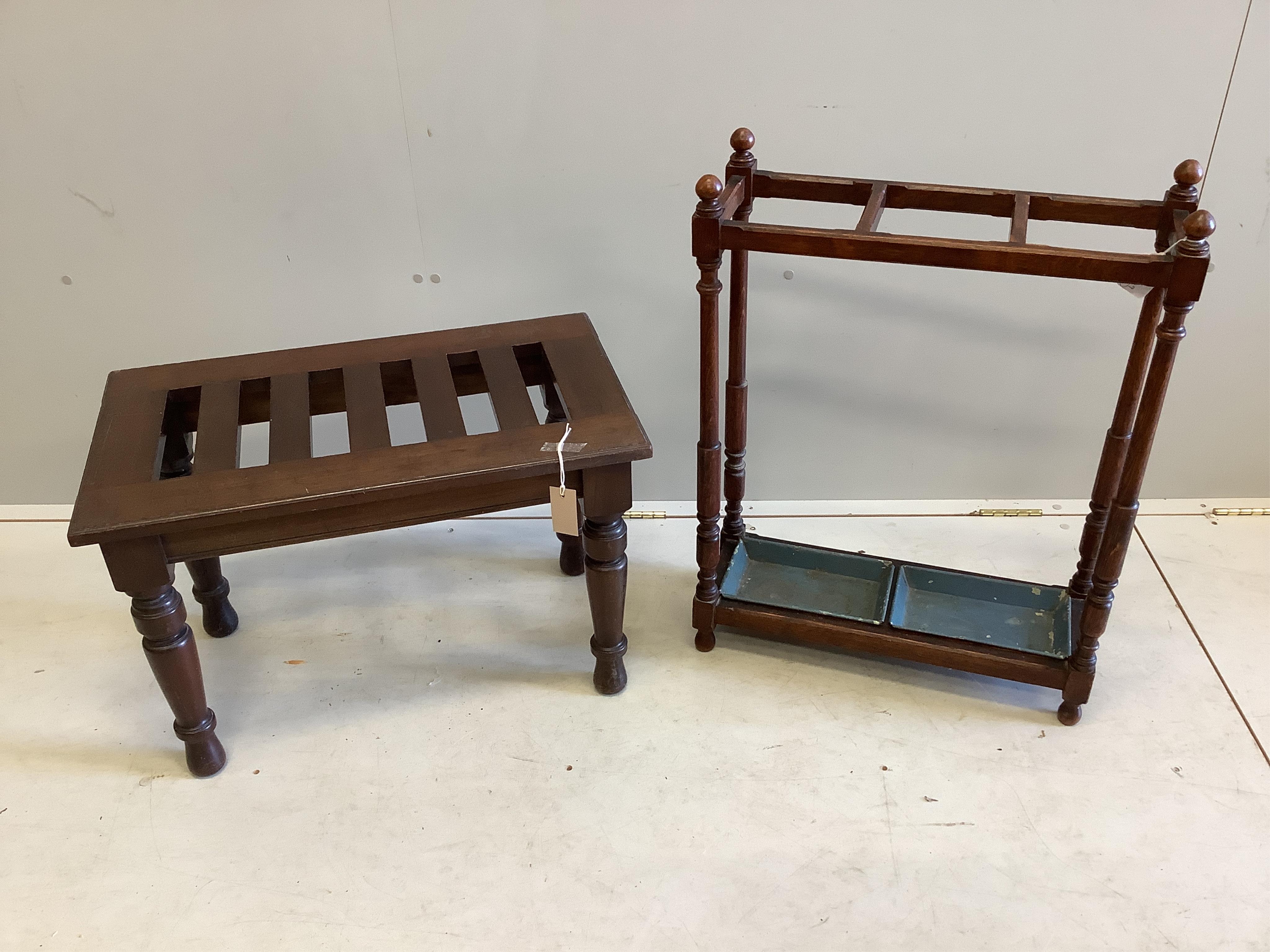 A late Victorian mahogany luggage stand on turned supports, width 69cm, depth 40cm, height 46cm