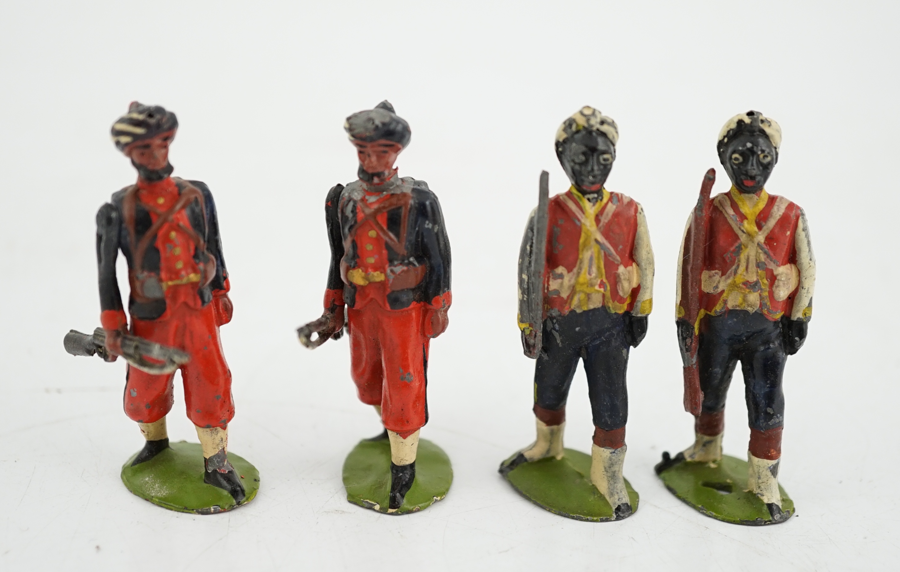 Twenty-five early twentieth century Britains lead soldiers including; eight Bombay infantry (