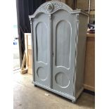 A Continental painted armoire, width 119cm, depth 50cm, height 190cm