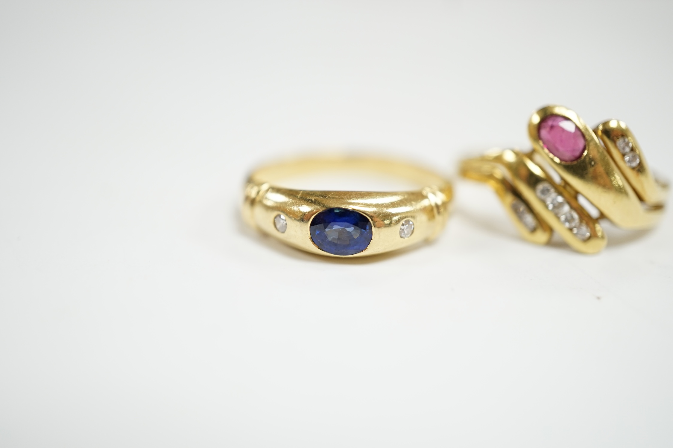 A modern 750 yellow metal and gypsy set single stone sapphire and two stone diamond set ring, size - Image 2 of 4