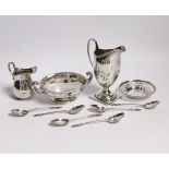 Two George V silver cream jugs, largest 12.5cm, a silver two handled pedestal bowl, a pierced