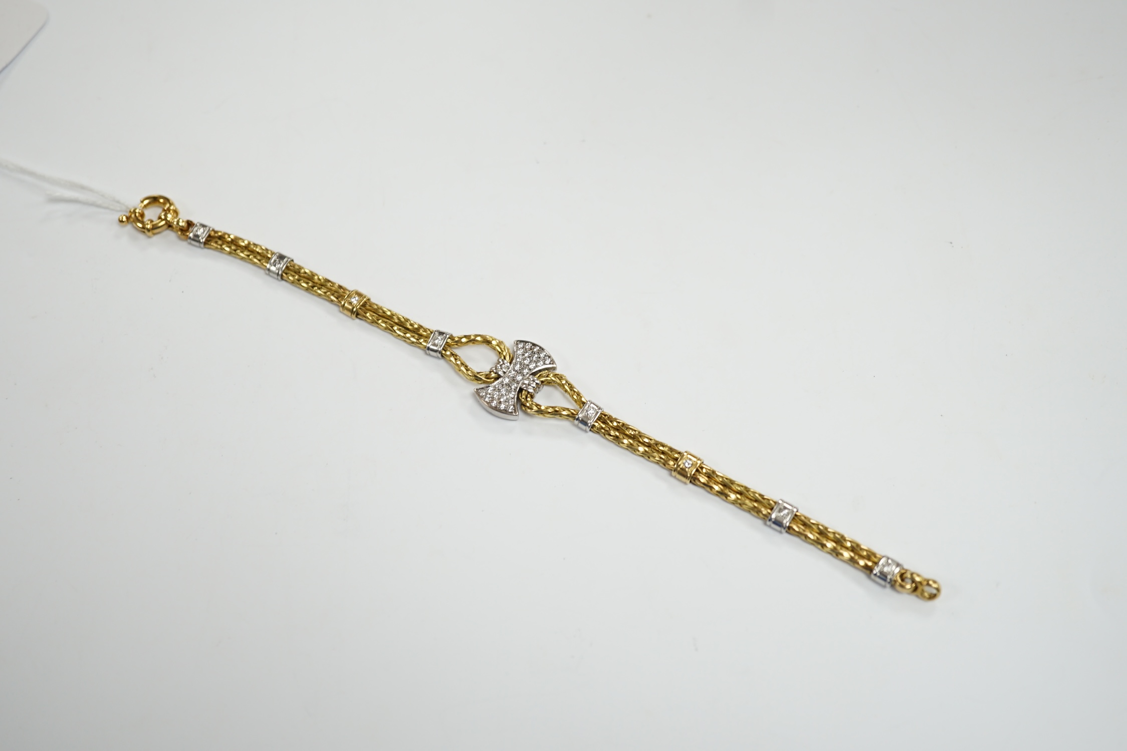 A modern 750 yellow metal and diamond cluster set bracelet, 21.5cm, gross weight 33.9 grams. - Image 2 of 5