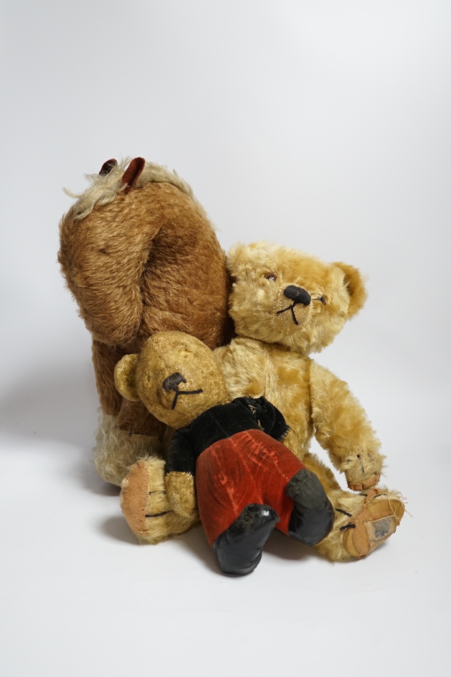 A Chad Valley teddy bear, 34cm high, a smaller bear in velvet clothes and a Merrythought horse - Image 2 of 8