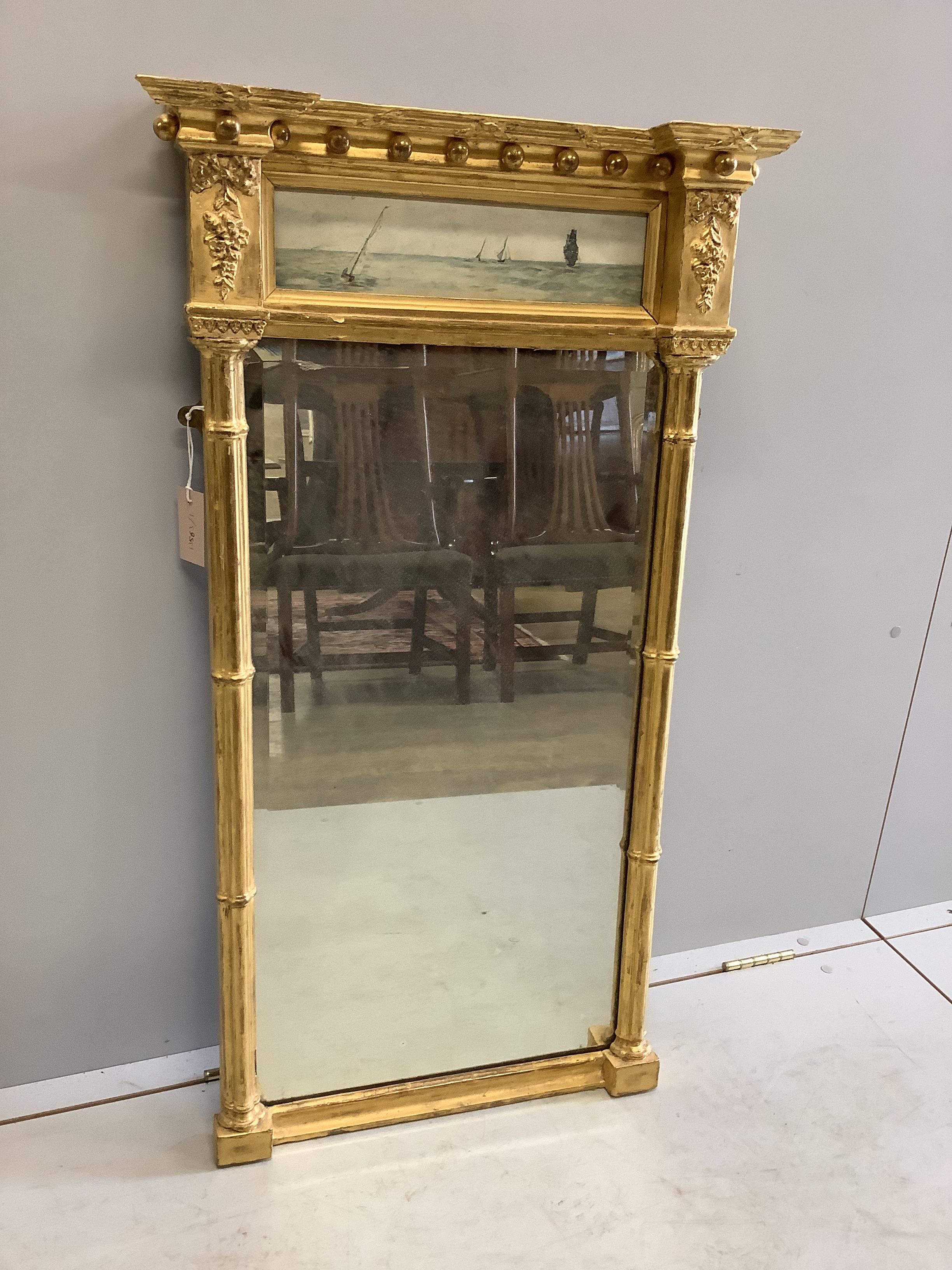 A Regency giltwood and composition pier glass, width 56cm, height 101cm