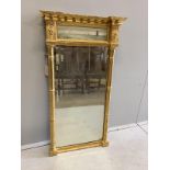 A Regency giltwood and composition pier glass, width 56cm, height 101cm