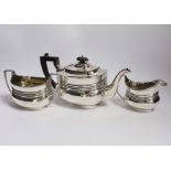 An early 20th century three piece silver tea set, by William Barnard & Sons Ltd, London, 1908/11,