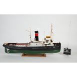 A kit built Maxwell Hemmens pond yacht style model of a 1930s Thames Tug after the firm Watkin &