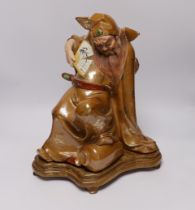 A Chinese enamelled porcelain figure of Li Bai on stand, third quarter 20th century, 39cm high