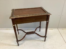 A 19th century French Empire mahogany writing table with gilt brass inlay, frieze drawer with fitted