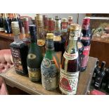 Twenty six bottles of spirits and liqueurs