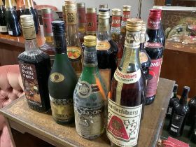Twenty six bottles of spirits and liqueurs