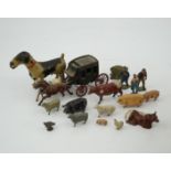 A collection of Britains, etc. lead farm animals and accessories, including the farmer, farmer’s