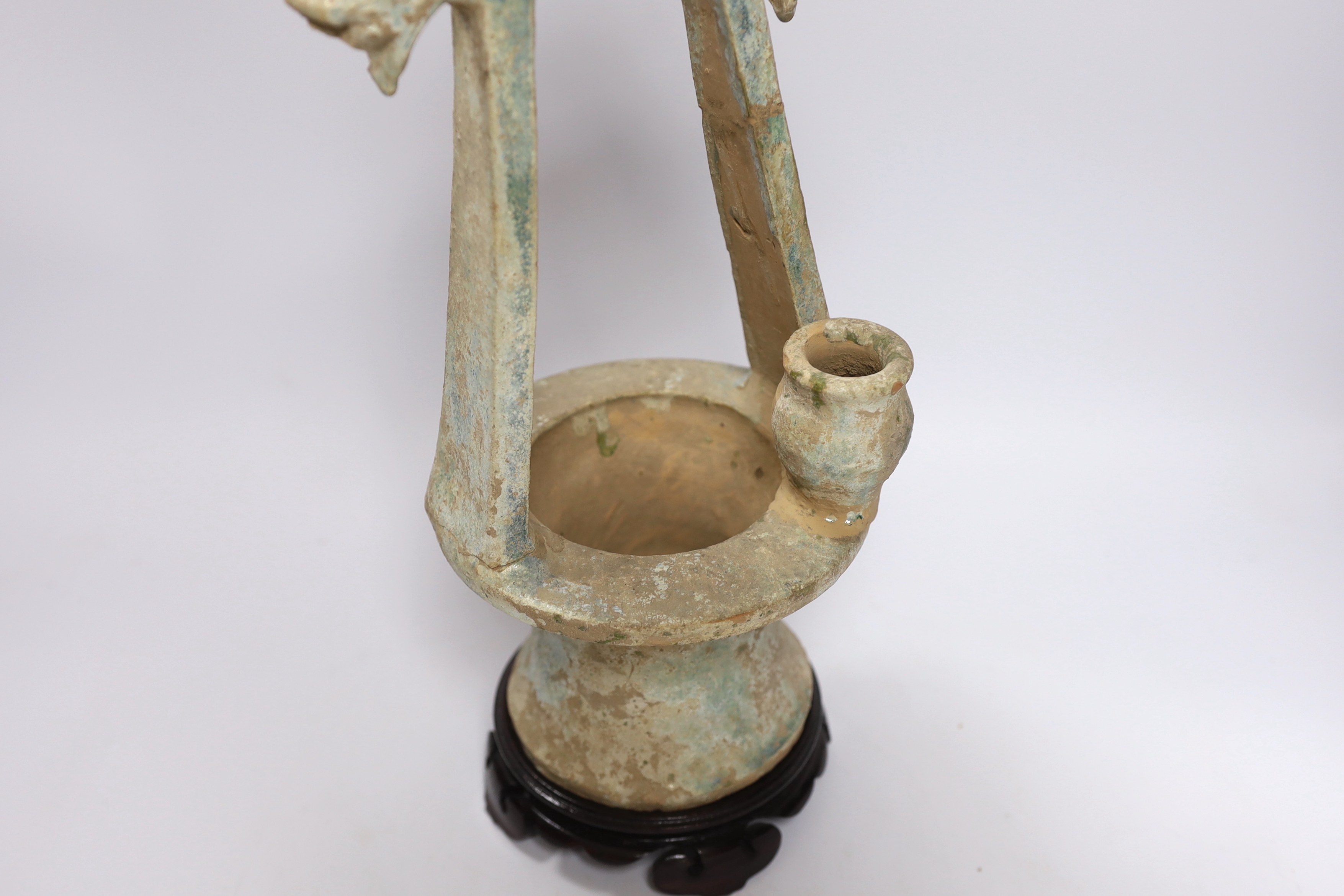 A Chinese glazed pottery model of a well, Han dynasty, with mineral iridescence, stand, 37cm high - Image 2 of 3