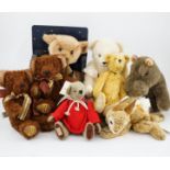 Two Merrythought John Lewis bears, a Harrodd 2000 bear, a Steiff yellow tag rabbit, two Deans bears,