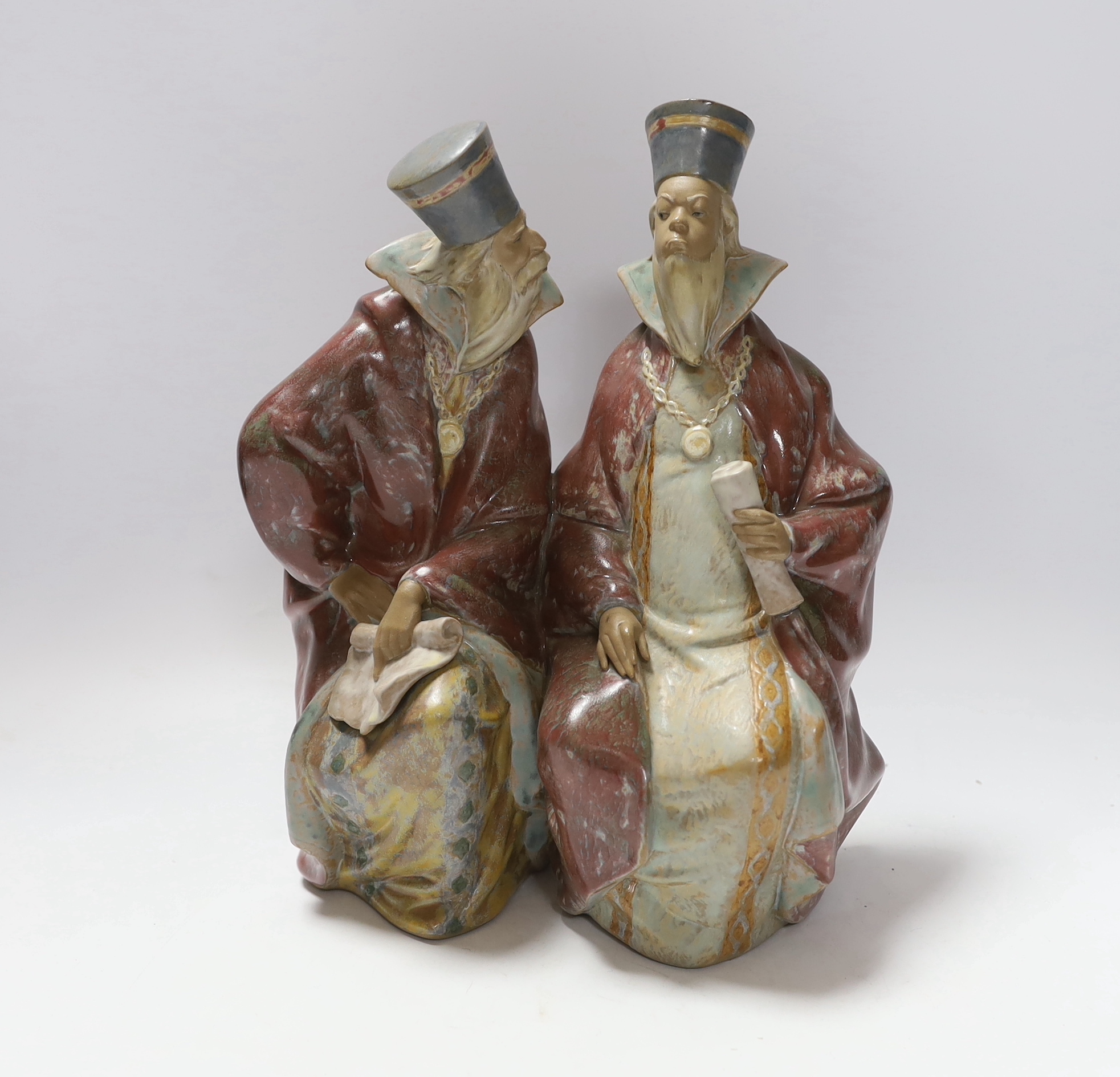 A Lladro stoneware group of two priests, 29cm