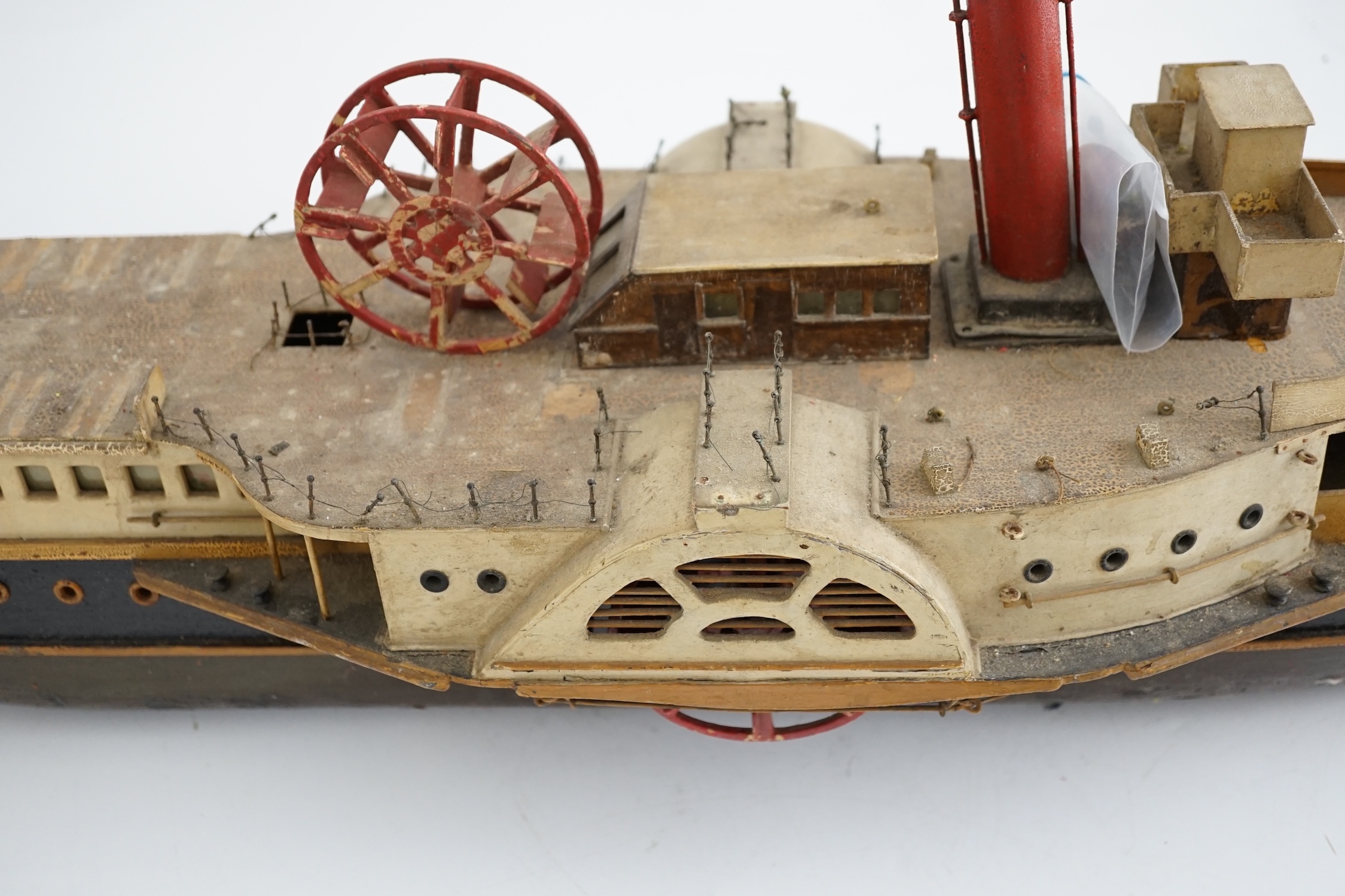 A wooden model of a paddle steamer, with a well detailed deck and with some age to the model, - Image 4 of 4