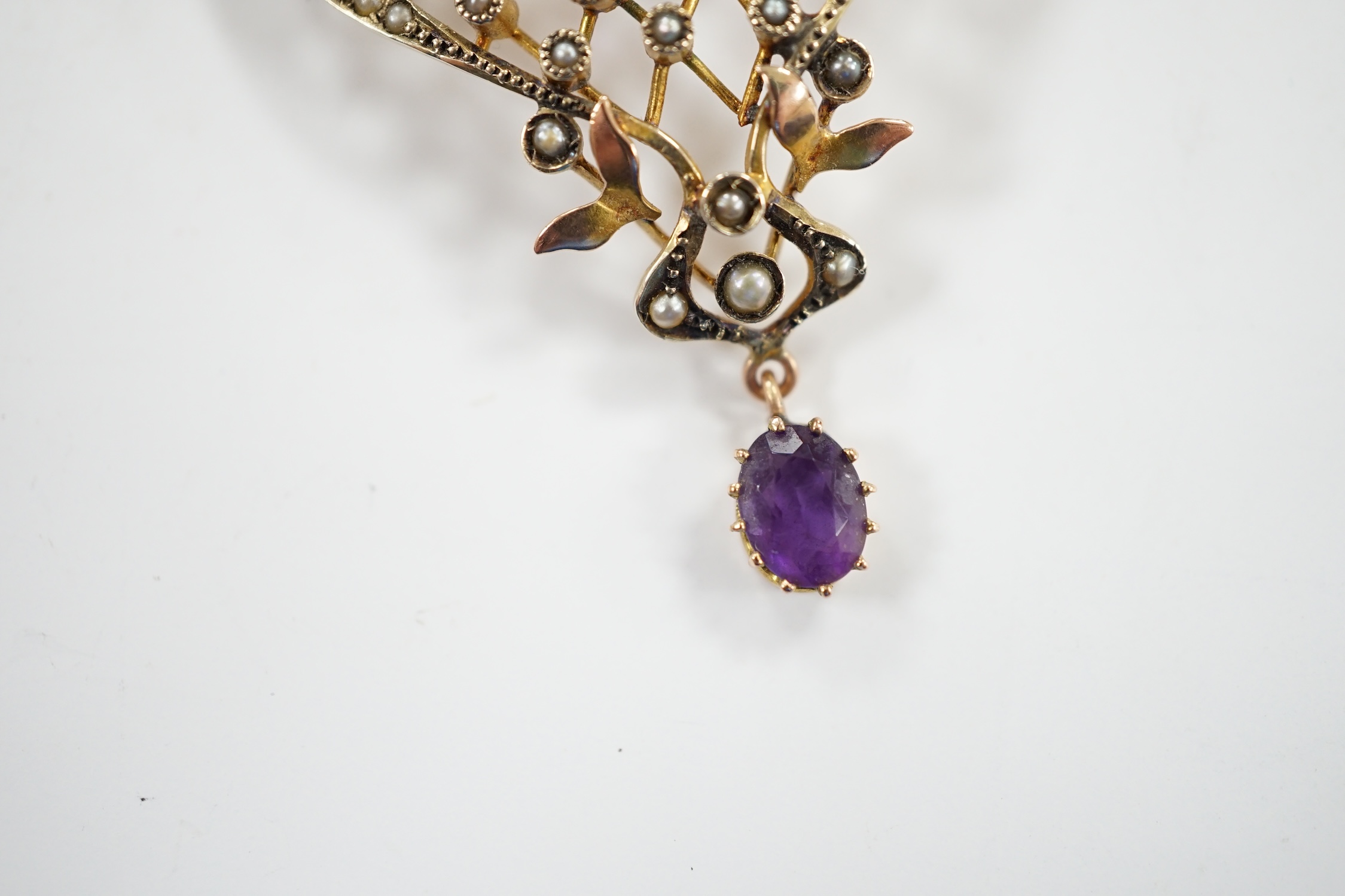 An Edwardian Art Nouveau 9ct, amethyst and seed pearl set drop pendant, 50mm, gross weight 5.2 - Image 2 of 6