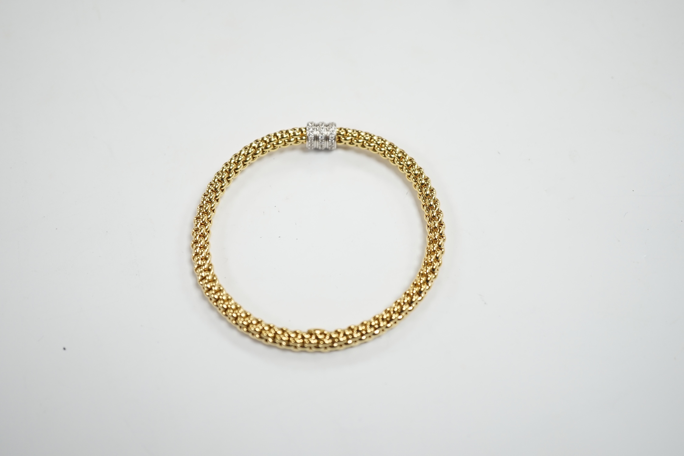 An Italian 18kt Fope flexible bracelet, with diamond chip set barrel shaped motif, gross weight 17.1 - Image 3 of 3