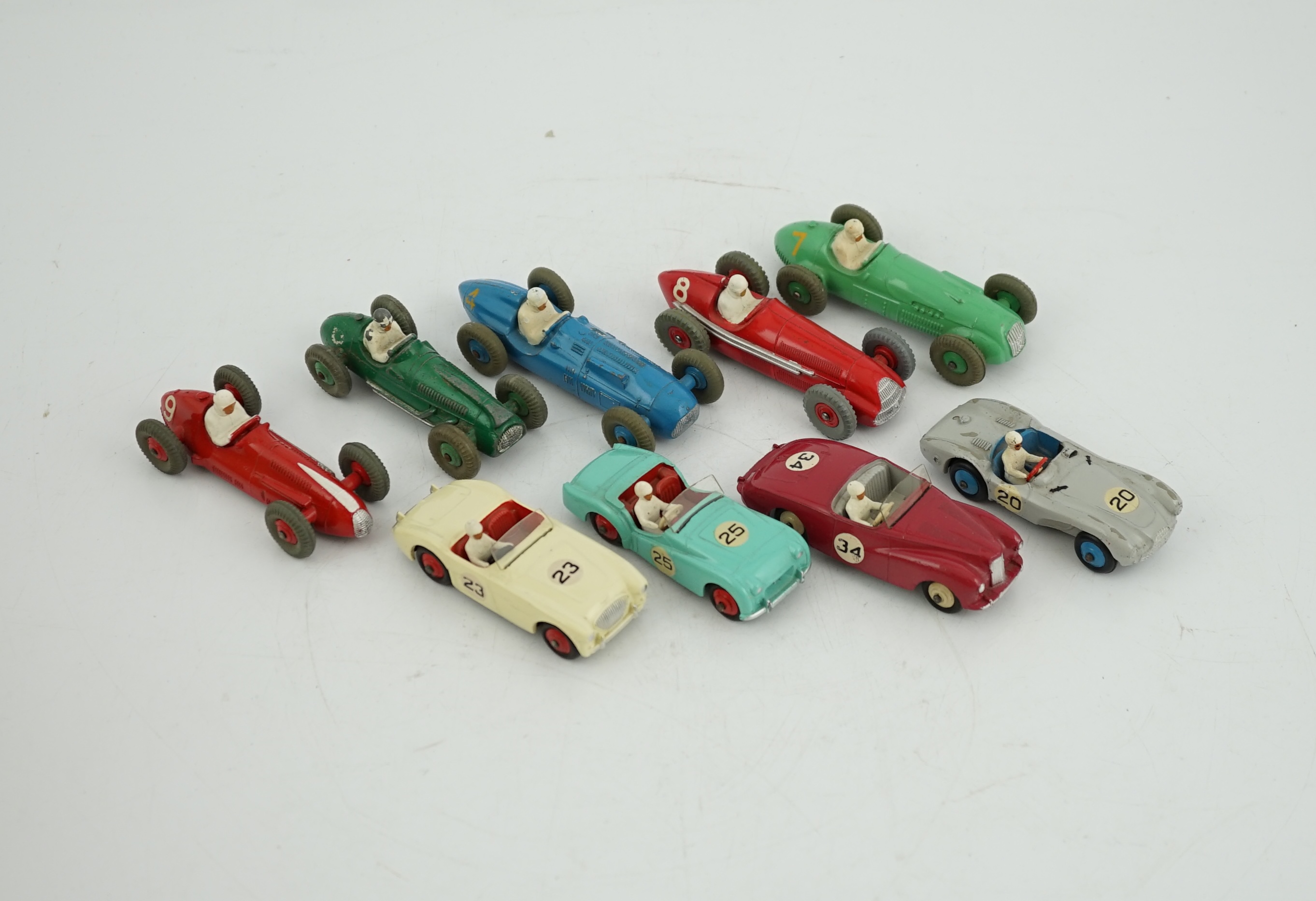 Nine Dinky Toys racing cars, including; Austin Healey, Triumph TR2, Sunbeam Alpine, Aston Martin,